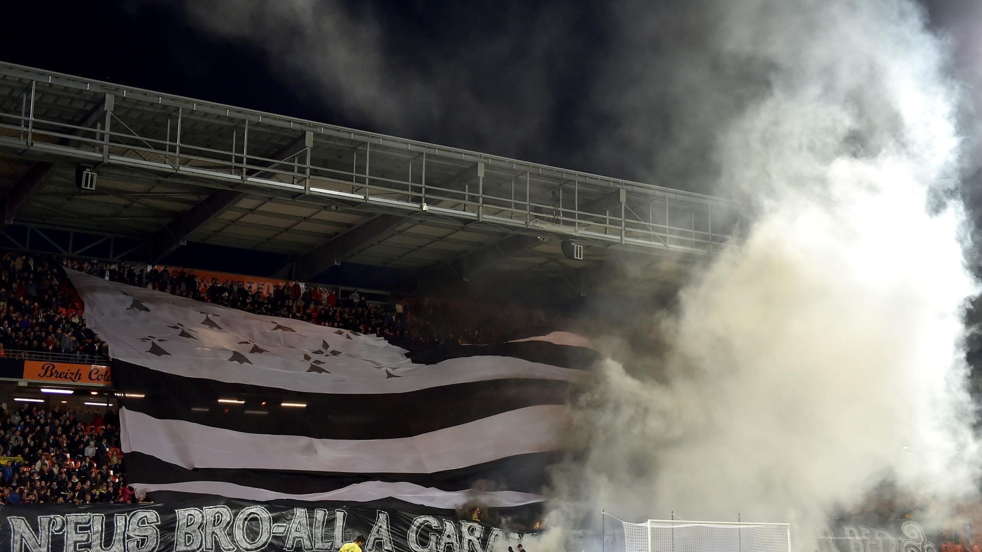 Lorient supporters with a Gwenn ha du flag. An even larger one, measuring 22 x 15 metres, has gone missing in Brittany - Credit: Photo: LOIC VENANCE/AFP via Getty Images