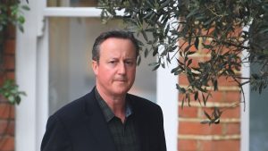 David Cameron outside his London home - Credit: PA