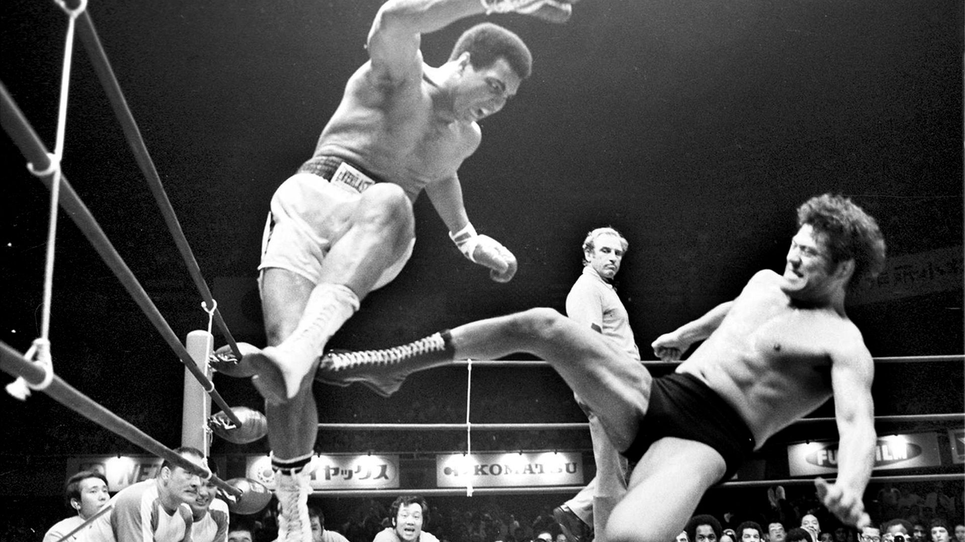 Muhammad Ali takes evasive action from a kick from Antonio Inoki during their bizarre 1976 clash - Credit: Getty Images