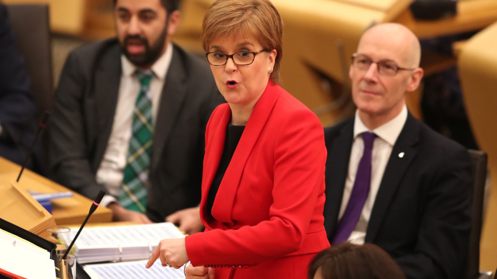 First Minister Nicola Sturgeon during First Minister's Questions at the Scottish Parliament in Edinburgh - Credit: PA Wire/PA Images