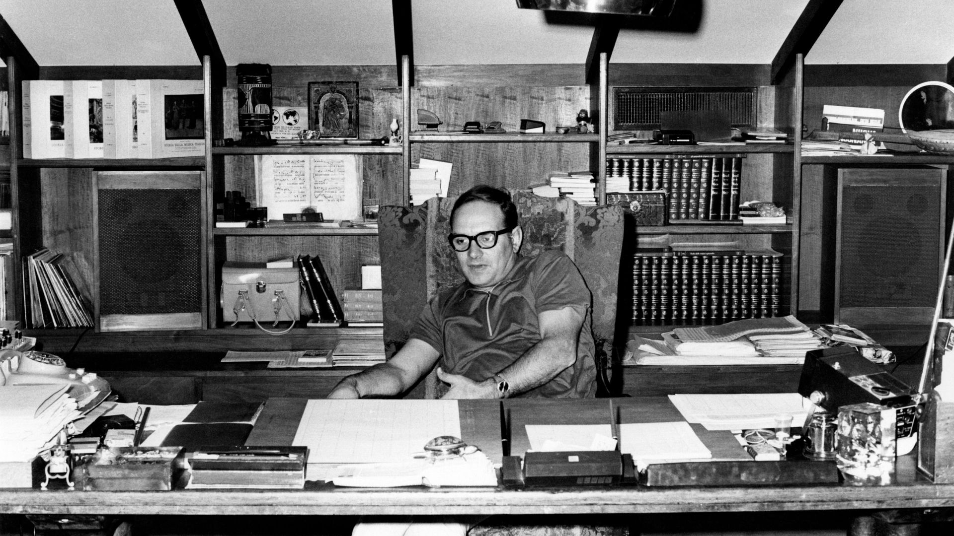 Ennio Morricone in his office in Rome in the 1970s - Credit: Mondadori via Getty Images