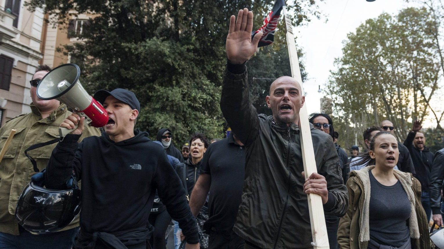 Forza Nuova (New Force) militants do the Nazi salute during an unauthorised march near Rome’s San Lorenzo neighbourhood, 2018 Photo: Michele Spatari/NurPhoto via Getty Images