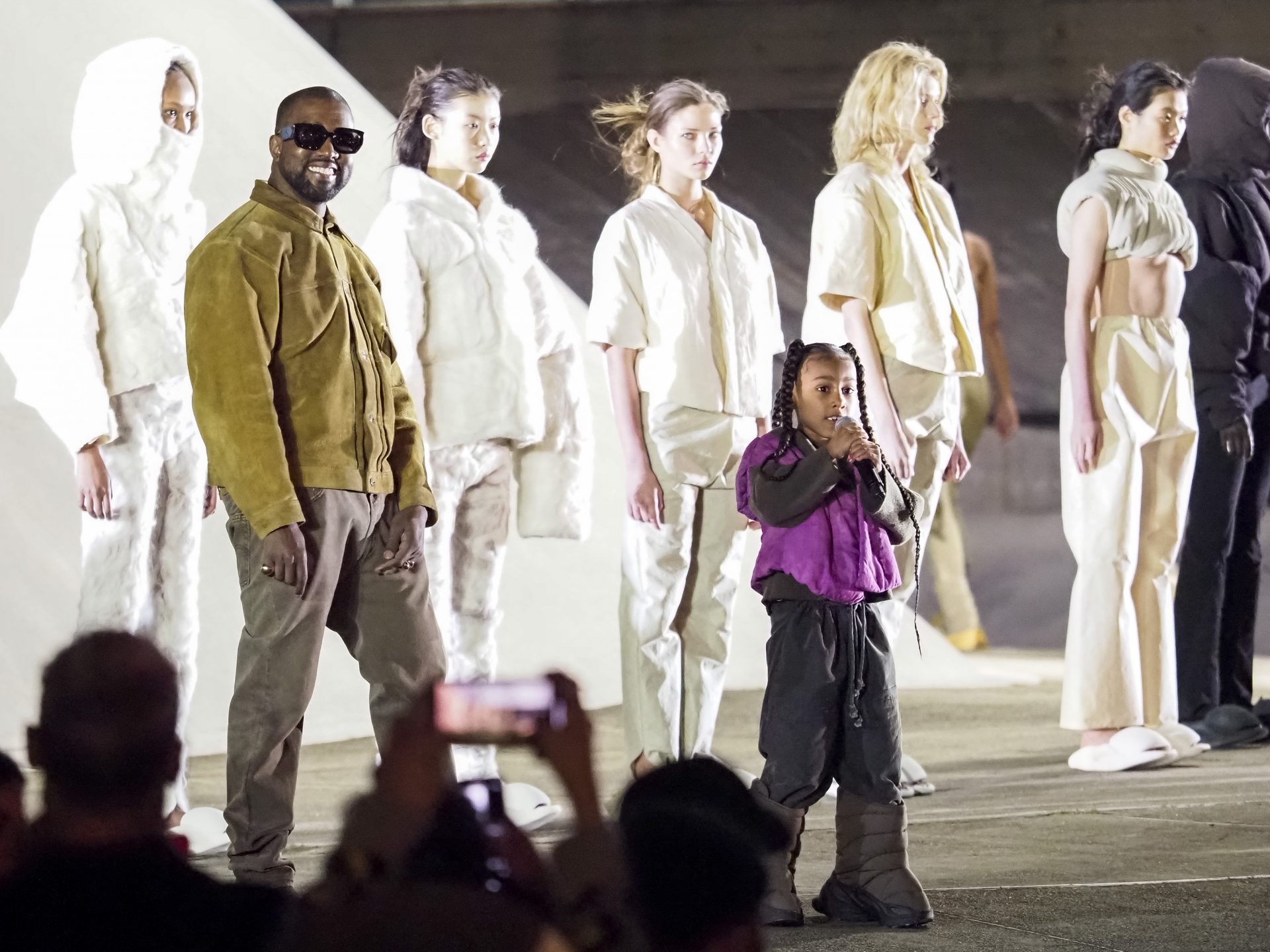 Kanye West and daughter North West on the runway of the Yeezy fashion show during Paris Fashion Week (Photo by Arnold Jerocki/GC Images)