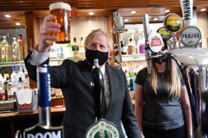 Bighead with a big head: Boris Johnson during a visit to The Mount Tavern pub and restaurant in Wolverhampton. Photo by Jacob King/POOL/AFP via Getty Images.