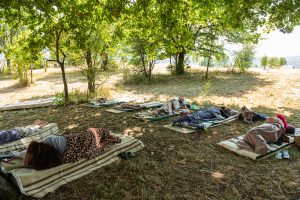 Competitors lie down during the traditional ‘laziness contest’ near Niksic, MontenegroPhoto: Milos Vujovic/Anadolu Agency via Getty Images.