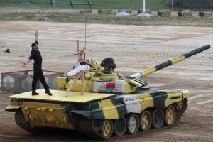 Dancers perform on the back of a T-72B3 tank at the opening ceremony of the 2021 International Army Games at the Alabino military training ground near Moscow. Photograph: Photo: Sergei Fadeichev/TASS/Getty Images.