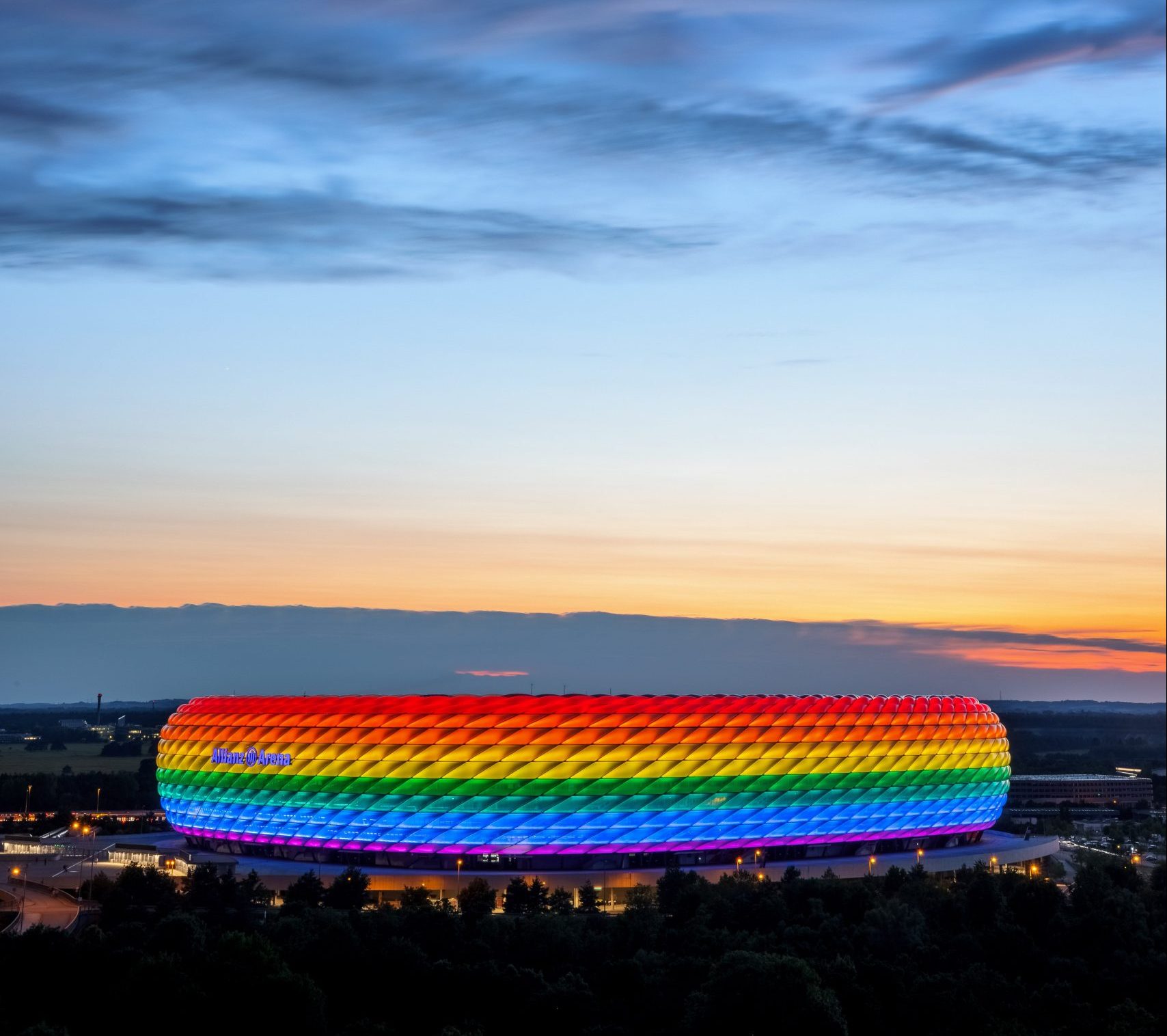 Three weeks after plans to light up Munich’s Allianz Arena in rainbow colours caused a major international row, the stadium has finally got the multi-coloured treatment