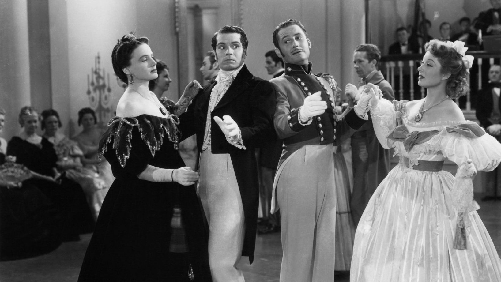 Maureen O’Sullivan, Laurence Olivier, Edward Ashley and Greer Garson on the dancefloor in the 1940 film version of Pride And Prejudice
