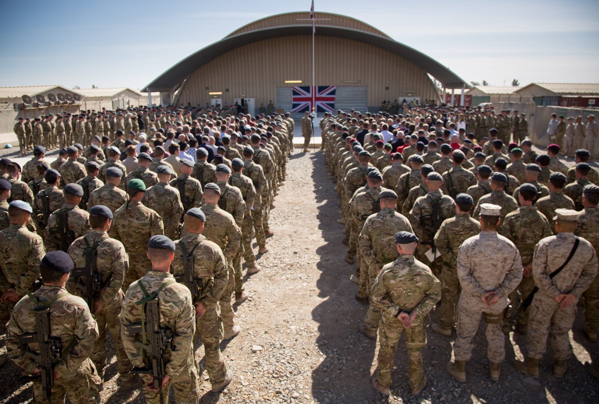 British troops and service personal gather for a Remembrance Sunday service at Kandahar Airfield, November 2014