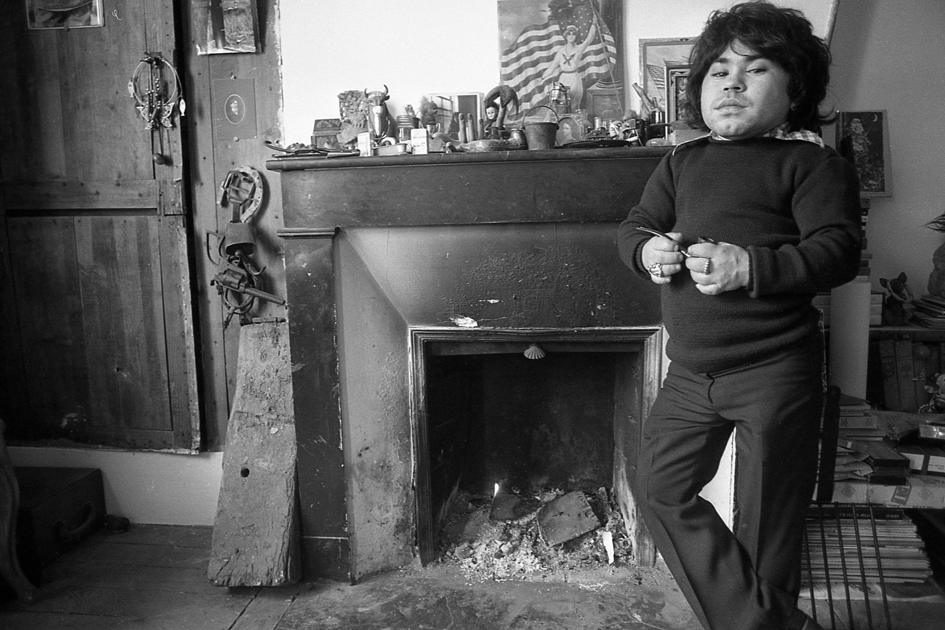 Herve Villechaize at home in his
apartment in Paris; circa 1973. Credit: Nik Wheeler/
Corbis via Getty Images