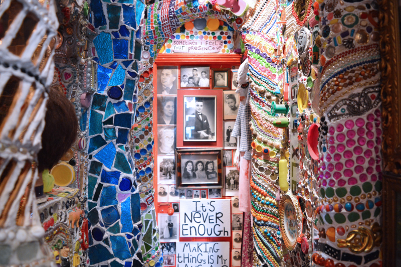 Details of the archways in the hallway. Most of the stained glass and strings of beads used for decoration were bought from a junk market in Porte de Montreuil in Paris. The door is covered with other peoples' family pictures bought in Lisbon and Porto in 2015. Credit: Stephen Wright