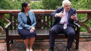 Priti Patel and Boris Johnson - both of whom have been criticised for their use of statistics - on a trip to Surrey Police HQ in July to talk about policing. Government claims over police numbers are among the numbers criticised