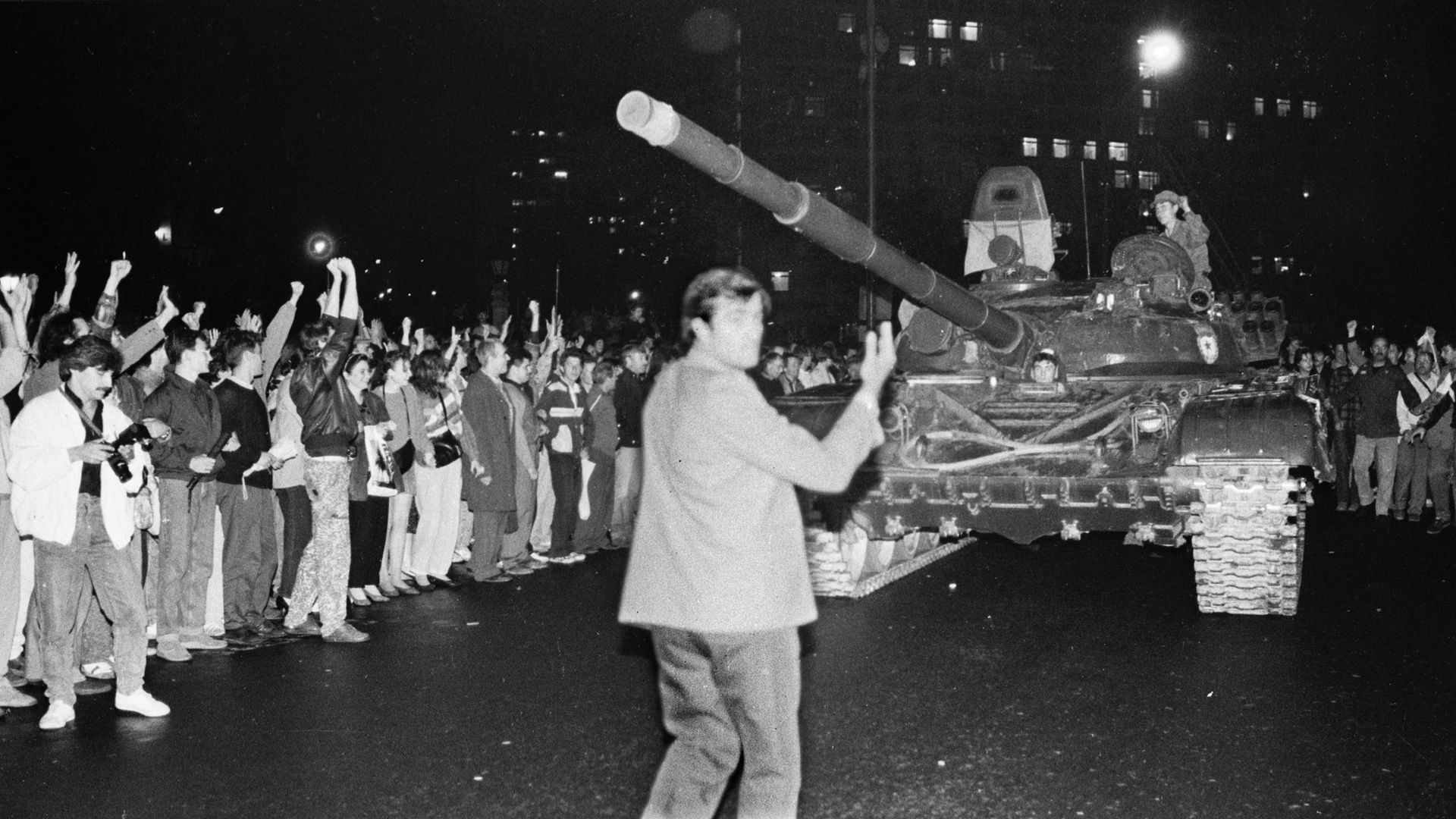 Protestors surround Soviet tanks as they drive towards the Russian White House in Moscow early on August 20, 1991