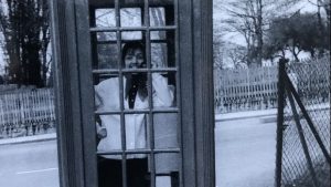 Patrick Sawer’s mother, Pina, in her first encounter with a red telephone box, South London, 1966. Photo: Patrick Sawer