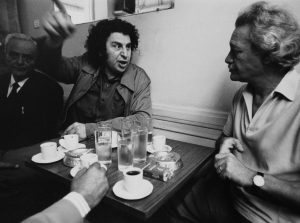 Mikis Theodorakis
is wrapped up in a
political discussion
in an Athens pub
after returning from
exile. Credit: Wolfgang
Kunz/ullstein bild via
Getty Images