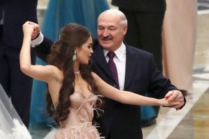 Miss Belarus 2018 Winner Maria Vasilevich (L) and Belarus' President Alexander Lukashenko dance at the republican Christmas youth ball. Photograph: Maxim Guchek/Getty Images.