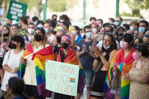 Protesters are seen wrapped in rainbow flags take part in a protest against homophobia and transphobia at Plaza de la Marina square after the homophobic murder of Spanish 24 year-old Samuel Luiz. (Photo by Jesus Merida/SOPA Images/LightRocket via Getty Images)