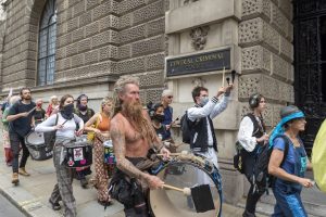 Drummers (some wearing what Will Self might class as pantaloon-style trousers) march past the Old Bailey during Extinction Rebellion’s two-week protests over the use of fossil fuels and the climate crisis. 
Photo: Dave Rushen/SOPA Images/LightRocket via Getty Images.