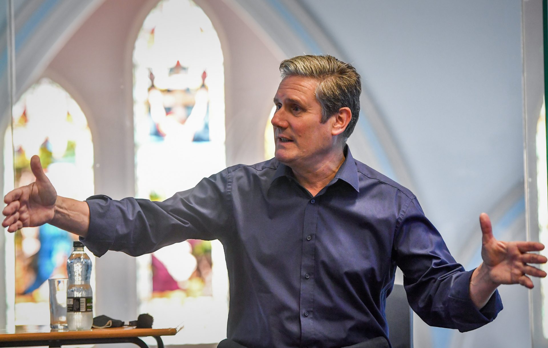 With a stained glass window in the
background, Labour leader Sir Keir
Starmer meets A-Level students at a
Catholic academy in Blackpool
Photo: Anthony Devlin/Getty Images