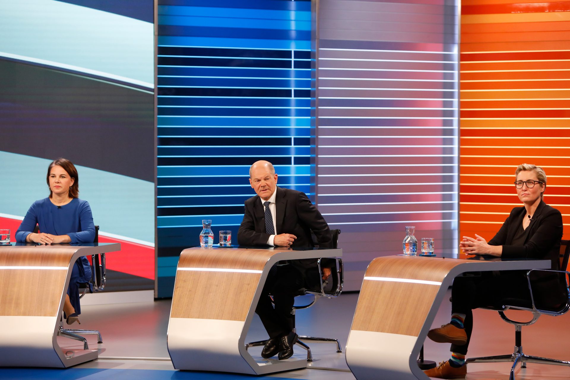 Annalena Baerbock, chancellor candidate of the German Greens Party, Olaf Scholz, chancellor candidate of the German Social Democrats (SPD) and Susanne Hennig-Wellsow (L-R), co-lead candidate of Die Linke are pictured ahead of a televised discussion at an ARD/ZDF studio following initial results. (Photo by Michele Tantussi/Getty Images)