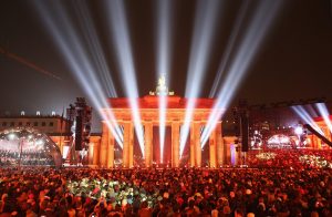 Light shines through the Brandenburg Gate during celebrations on the 25th anniversary of the fall of the Berlin Wall on November 9, 2014. Photo by Sean Gallup/Getty Images.