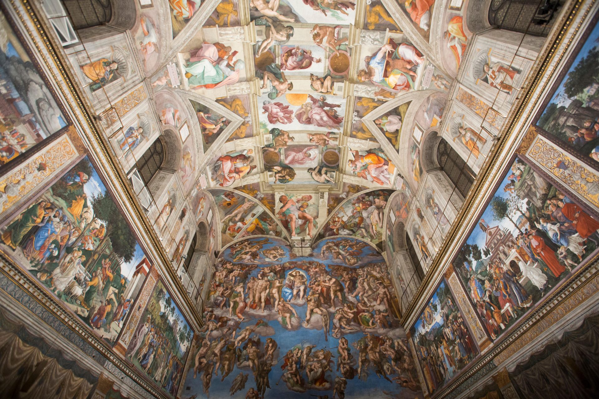 Michelangelo’s Sistine Chapel ceiling and depiction of the Last Judgment on the altar wall.