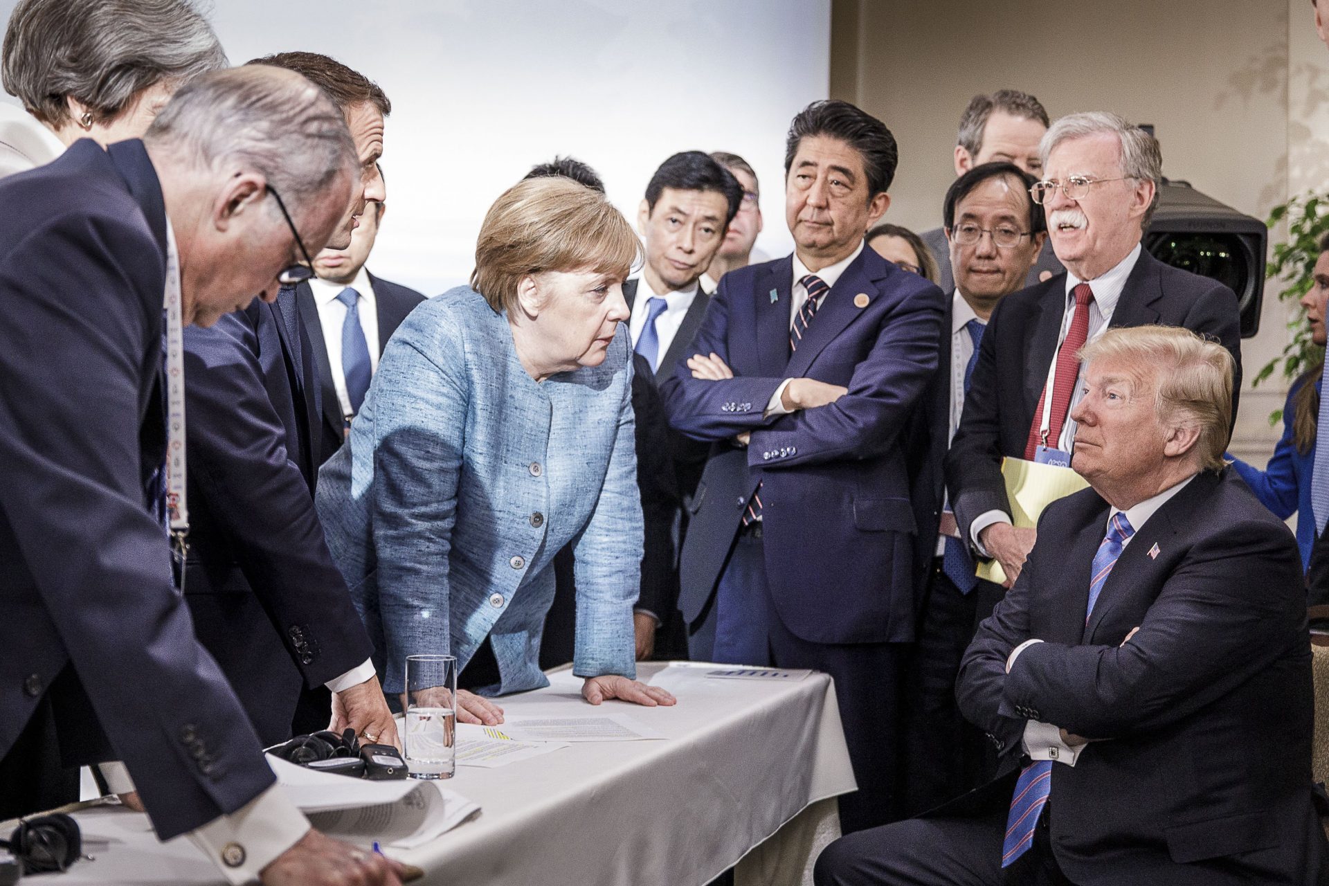 As other global leaders look on, Angela Merkel leads a debate with then US president Donald Trump at the 2018 G7 summit in Canada. Photo: Jesco Denzel / Bundesregierung