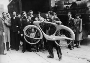 Designer B.G. Bowden with his ‘Streamline’
cycle, exhibited at the Britain Can Make It show.
Features included a hub dynamo/motor, which
stored energy while the bicycle was travelling
downhill and released it on uphill gradients, as
well as a radio. Credit: J. A. Hampton/Getty