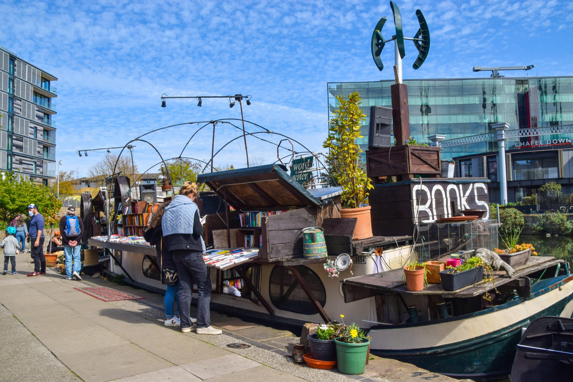 Customers browse the books at
the Word on the Water floating
bookshop on Regent’s Canal in
London’s King’s Cross. Credit: SOPA Images/LightRocket via
Getty Images