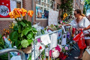 Flowers are laid at the scene of the murder of Peter de Vries earlier this year. Picture: Getty Images.