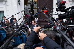 Man in the middle.. Sebastian Kurz at the centre of a media frenzy as the scandal around him deepened. Photo: Thomas Kronsteiner/Getty Images.