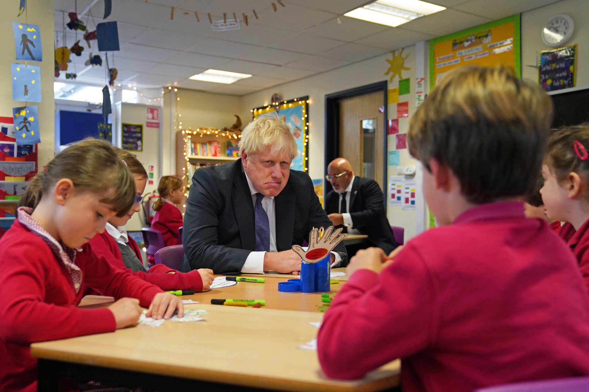 Prime Minister Boris Johnson interacts with school children during a visit to Westbury-On-Trym Church of England Academy in Bristol. Photograph: PA Images.