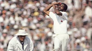 Michael Holding in action for the West Indies in a Test against India in 1983, as umpire Swaroop Kishen looks on. Credit: Hulton Archive/Getty