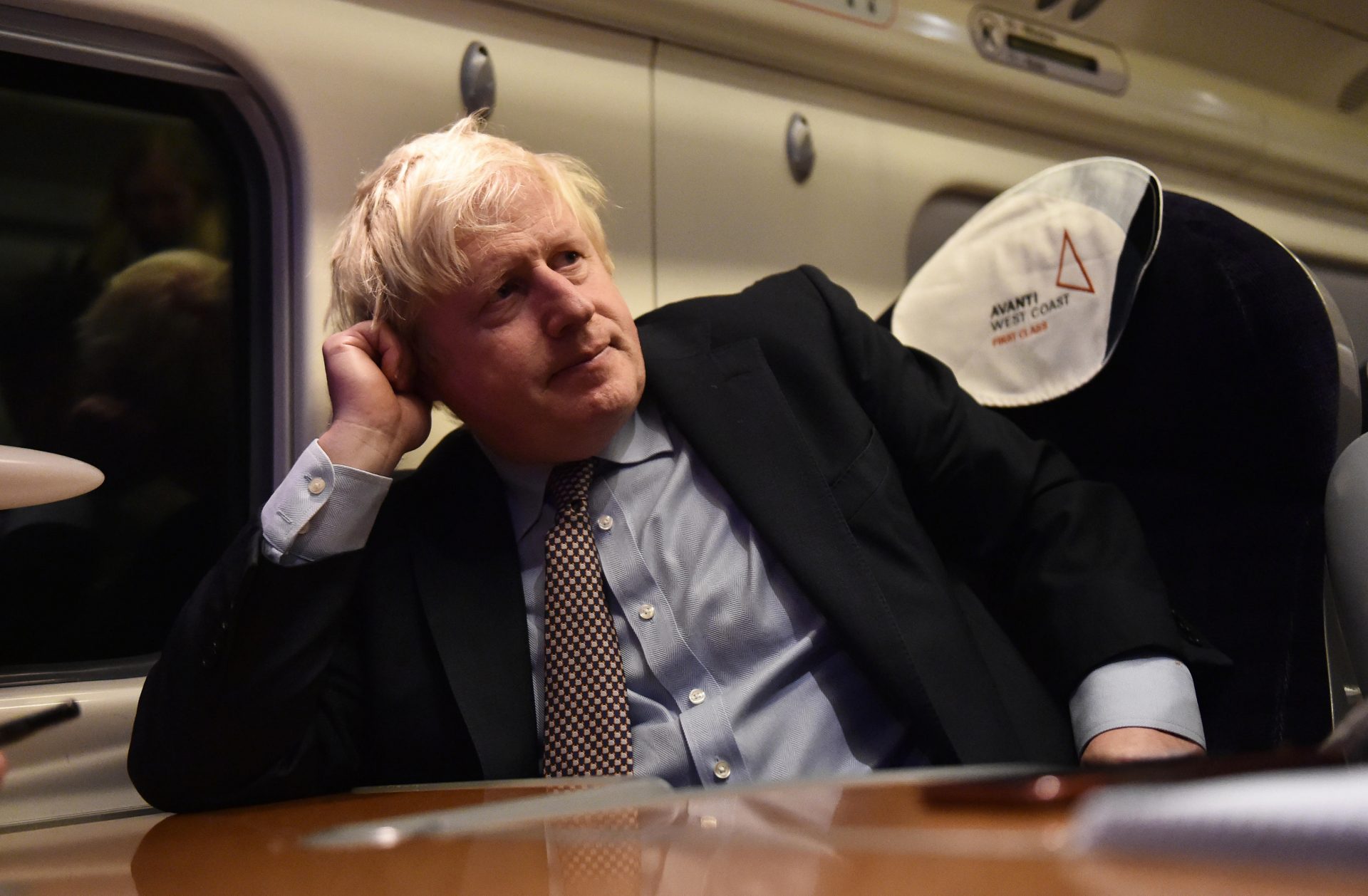 Boris Johnson on board a train for the launch of his misfiring Integrated Rail Plan, which has caused more anger among Red Wall Tory voters and MPs. Photo: Nathan Stirk