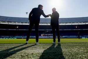 Ajax chief executive Edwin van der Sar and coach Erik ten Hag fist bump before a match. Photo: Laurens Lindhout/ Soccrates/Getty Images