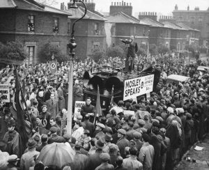 The former leader of the British Union of Fascists, Oswald Mosley addresses a large crowd at a meeting in east London, from the roof of a vehicle. In 1948 he lauched his “Union” movement which argued for a politically and economically united Europe.   
Photo: Hulton-Deutsch Collection/CORBIS/Corbis via Getty Images.