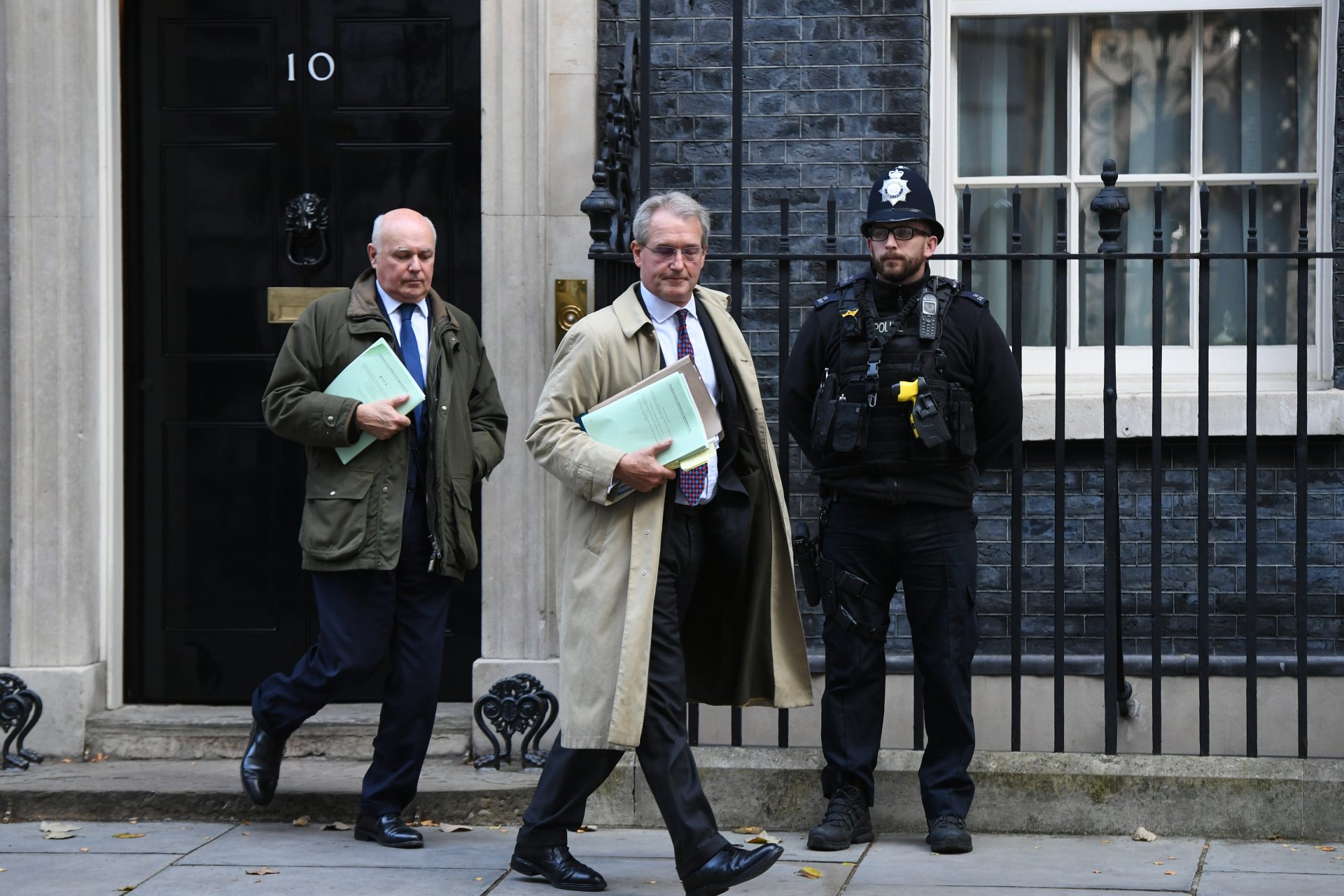 Iain Duncan Smith and Owen Paterson (right) leaving Downing Street, London after attending a meeting. Photograph: PA.