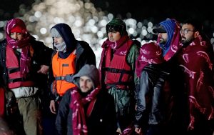 A group of people thought to be migrants are brought in to Dover following a small boat incident in the Channel after 27 people died in the worst-recorded migrant tragedy in the Channel. Photo: Gareth Fuller/PA Wire/PA Images.
