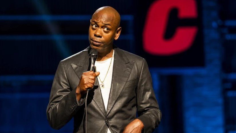 Dave Chapelle on stage in Netflix’s The Closer. His stand-up special has attracted controversy and caused staff walkouts at the streaming service. Photo by Netflix
