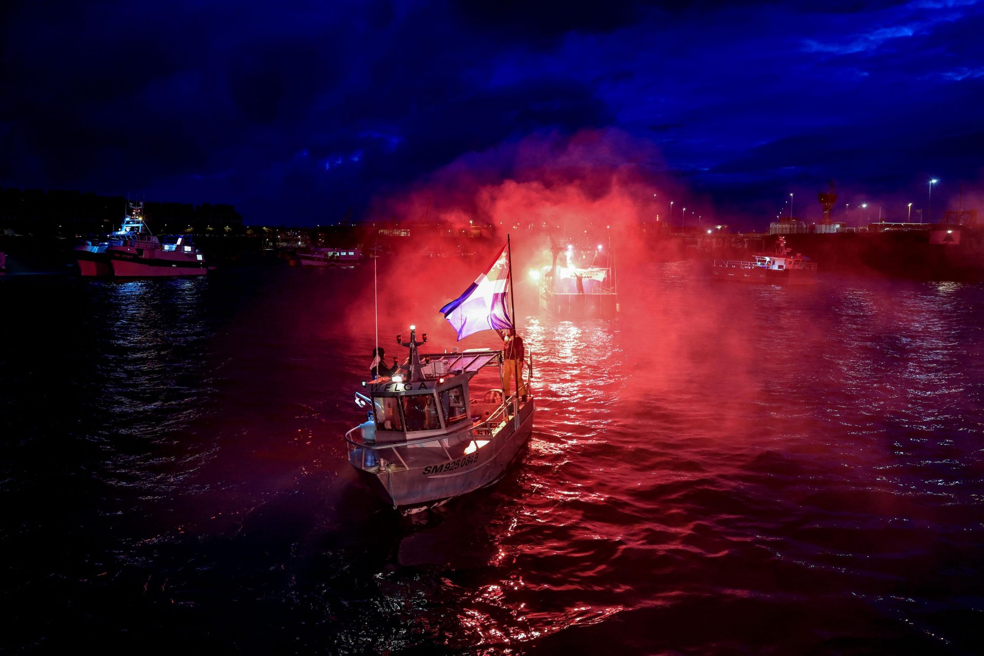 French fishing boats block the entrance to the port of Saint-Malo as part of a postBrexit dispute over fishing licences in UK waters. Photo: Sameer Al-Doumy/AFP via Getty Images