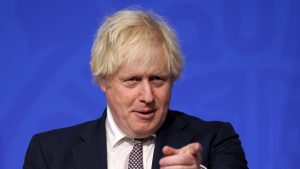 Boris Johnson gestures during his media briefing
on the Covid-19 Photo: Hollie Adams/Pool/AFP via Getty Images.