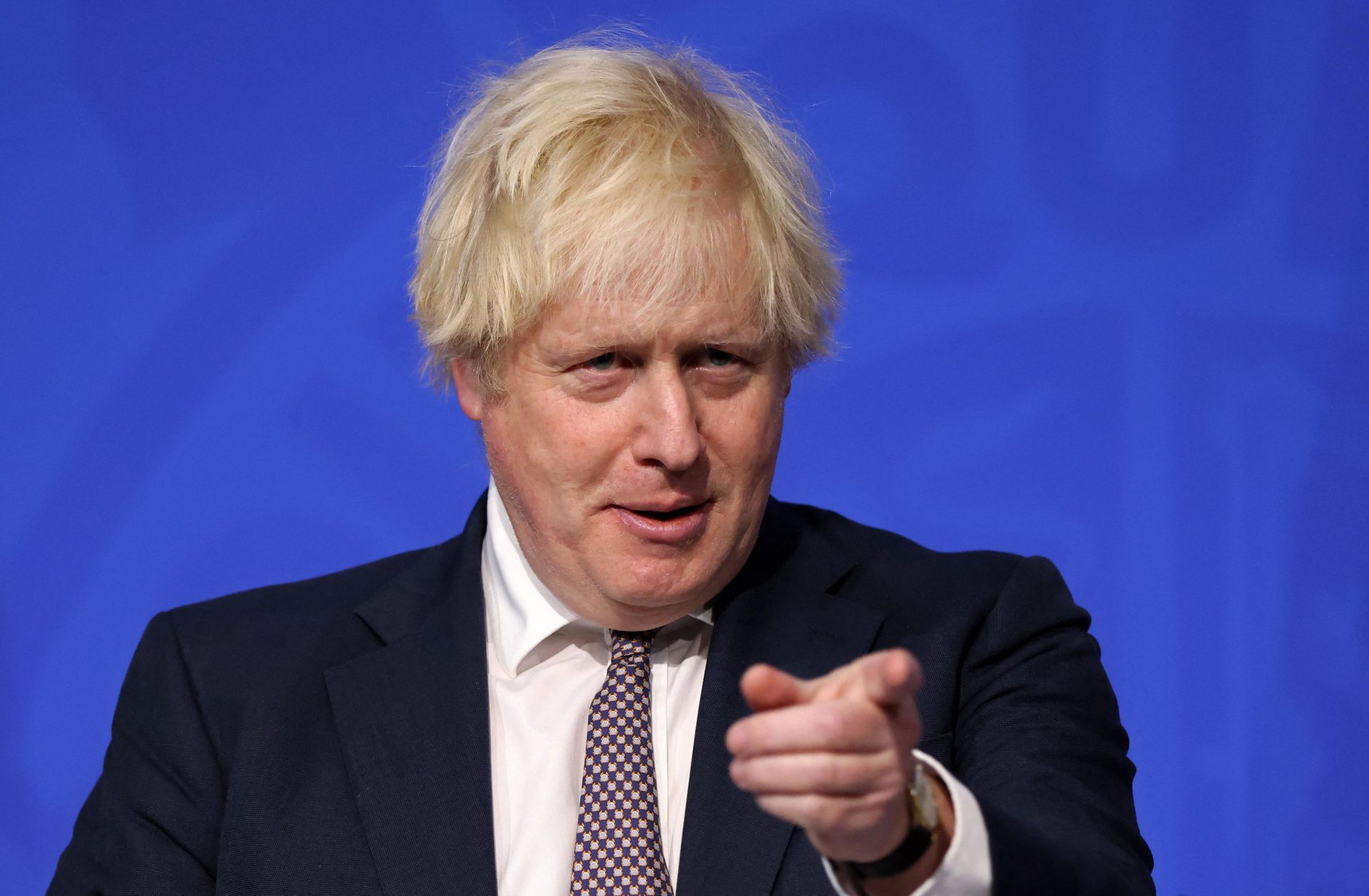 Boris Johnson gestures during his media briefing
on the Covid-19 Omicron strain. Photo: Hollie Adams/Pool/AFP via Getty Images.