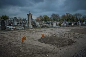 The graves of Ali Ismail Ali Ahmed, left, and Ibrahim Hamat Abdallah, who died crossing the Channel, lie in a section of the Calais graveyard reserved for migrants. Photo: by Kiran Ridley/Getty Images