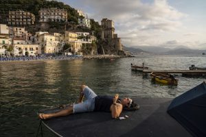 Lying on the dock of the bay of Naples: A scene from the stunning The Hand of God. Photo: Gianni Fiorito.