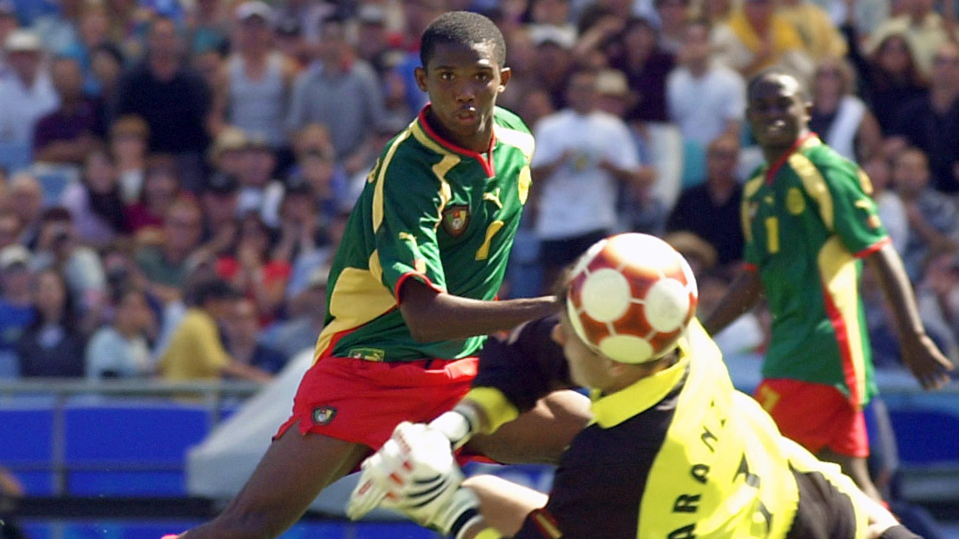 Cameroon's Samuel Eto'o scores against Spain as Cameroon win gold in the 2000 Olympic football final. Photo: Gabriel Bouys/Getty.