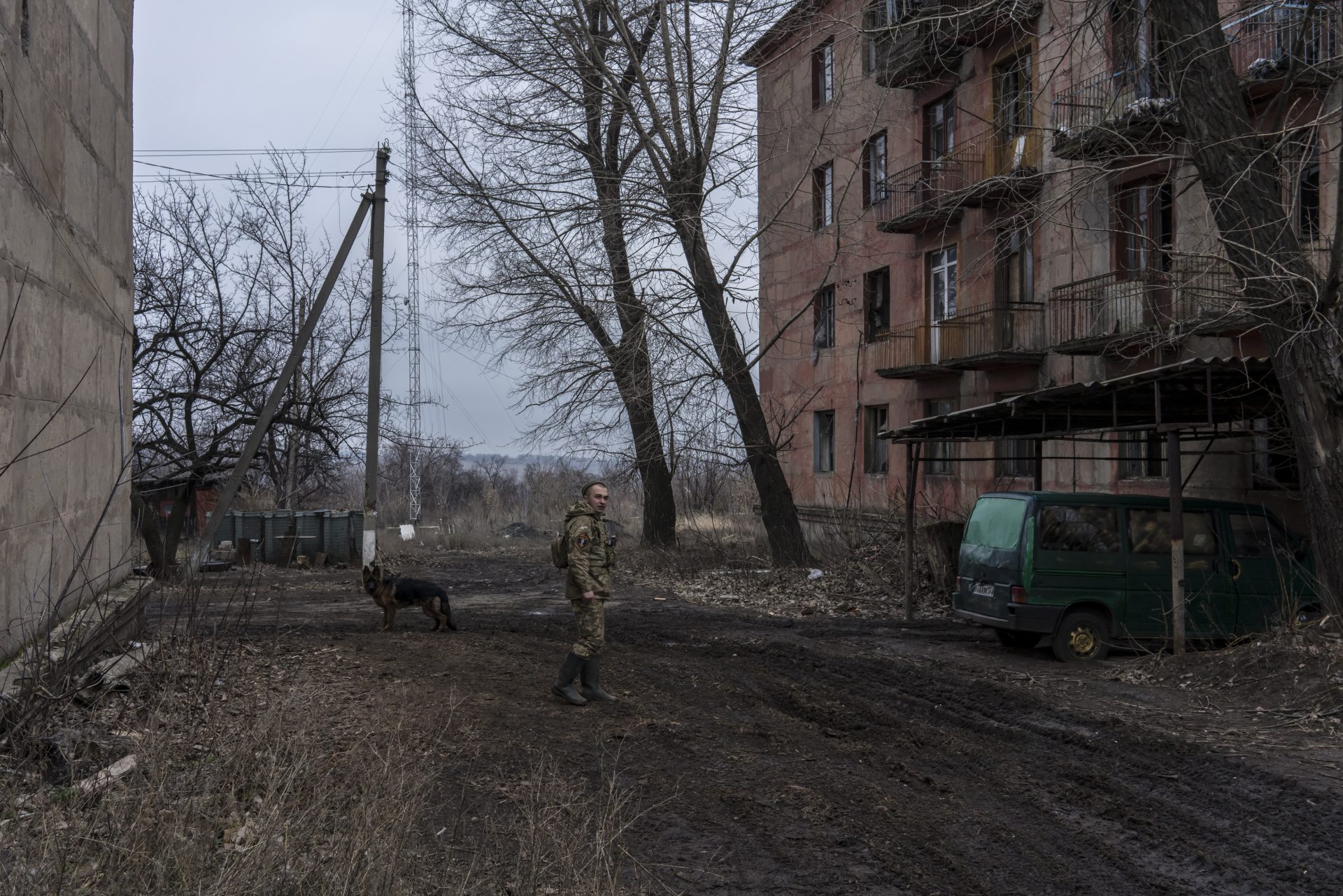 A Ukrainian soldier stands outside his brigade’s barracks
on the front line in Zolote. Photo: Brendan
Hoffman/Getty 

