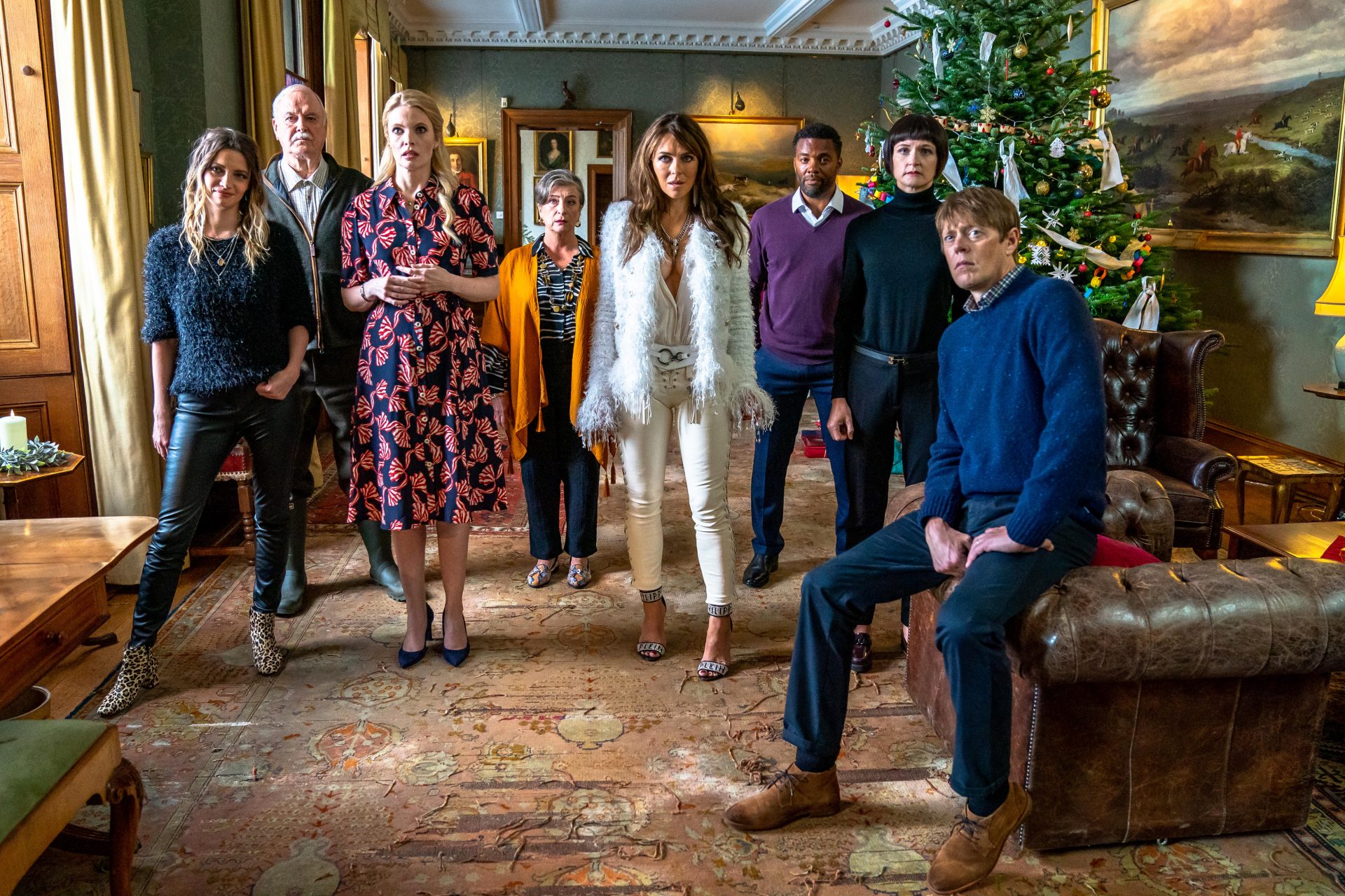 John Cleese, Elizabeth Hurley and Kris Marshall are among the unfortunate cast of the dreadful Father Christmas Is Back. Photo: Netflix.