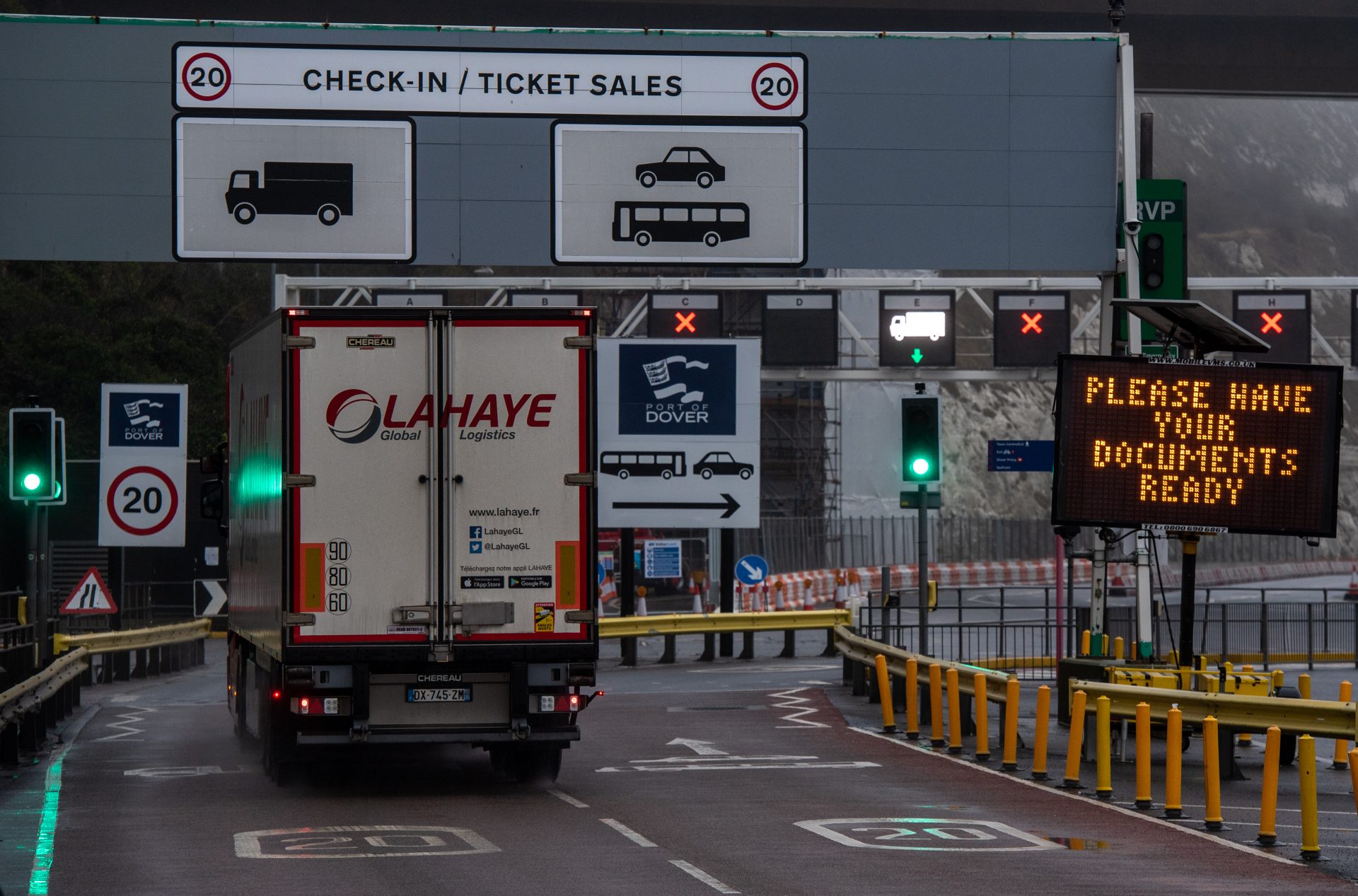 Lorries and heavy goods vehicles make their way into the Port of Dover on December 30, 2021 in Dover, England. Businesses importing products of animal origin, animal by-products and high risk foods not of animal origin (HRFNAO) must notify the UK authorities least four hours in advance of their arrival into Great Britain as from January 1, 2022