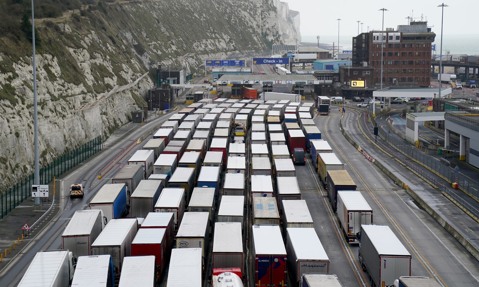 Lorries queue at the entrance to the Port of Dover, where delays are being caused to the transportation of goods across the channel after exports between Great Britain and the EU became subject to full customs controls on January 1. Photo:  Gareth Fuller/PA Wire/PA Images.