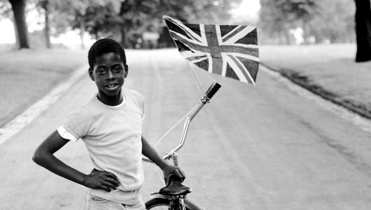 Boy With Flag, Winford, In Handsworth Park by Vanley Burke. Photo: Vanley Burke